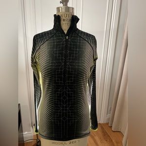 Nike Pro ( women’s) neon yellow and black geo print half zip. Size: M